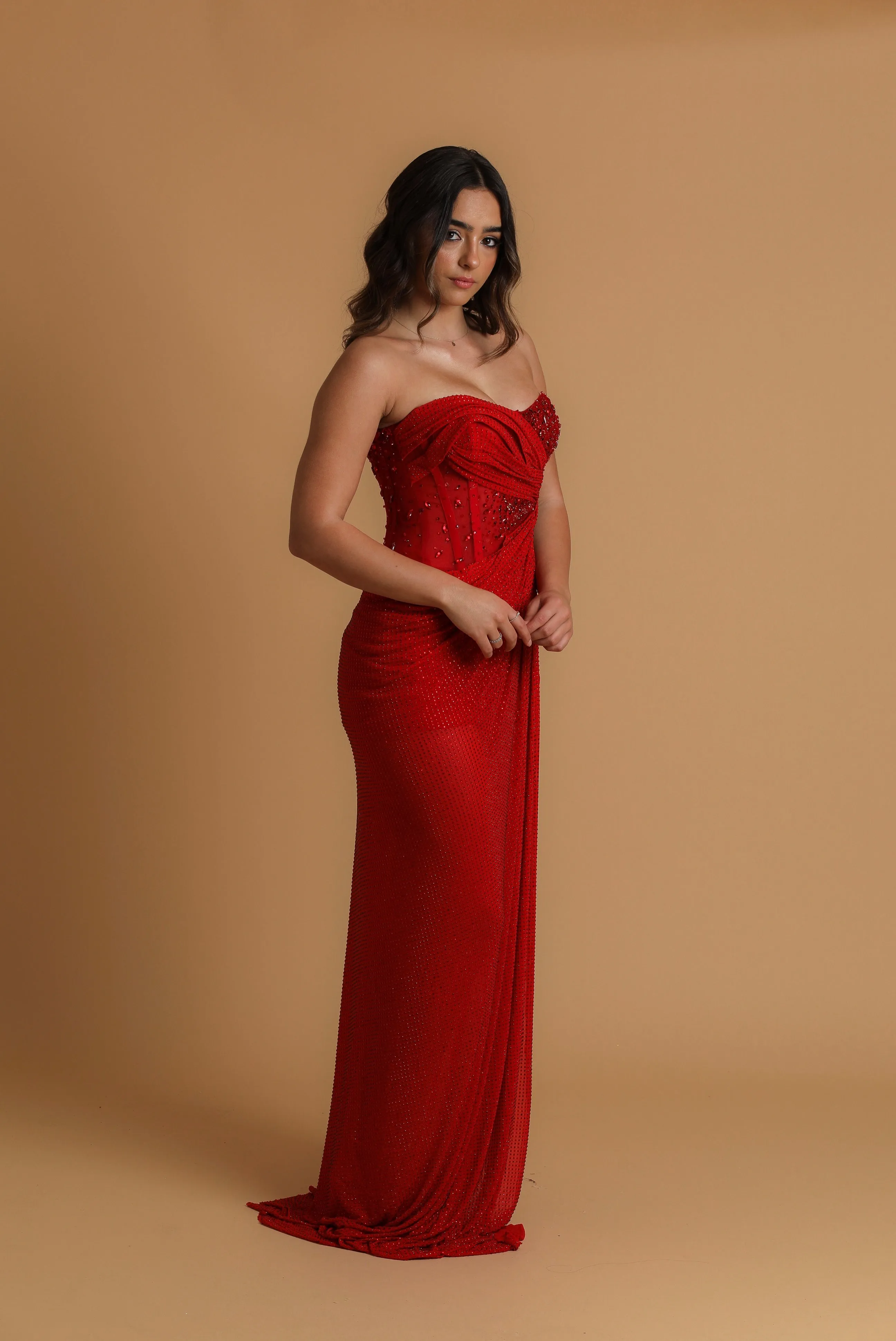 Red satin column shaped dress with  and high slit for hire